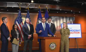 Sam speaking at the New Dems press conference