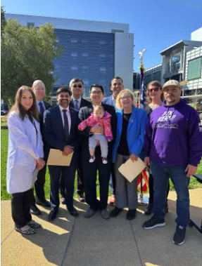 Sam with health care advocates.